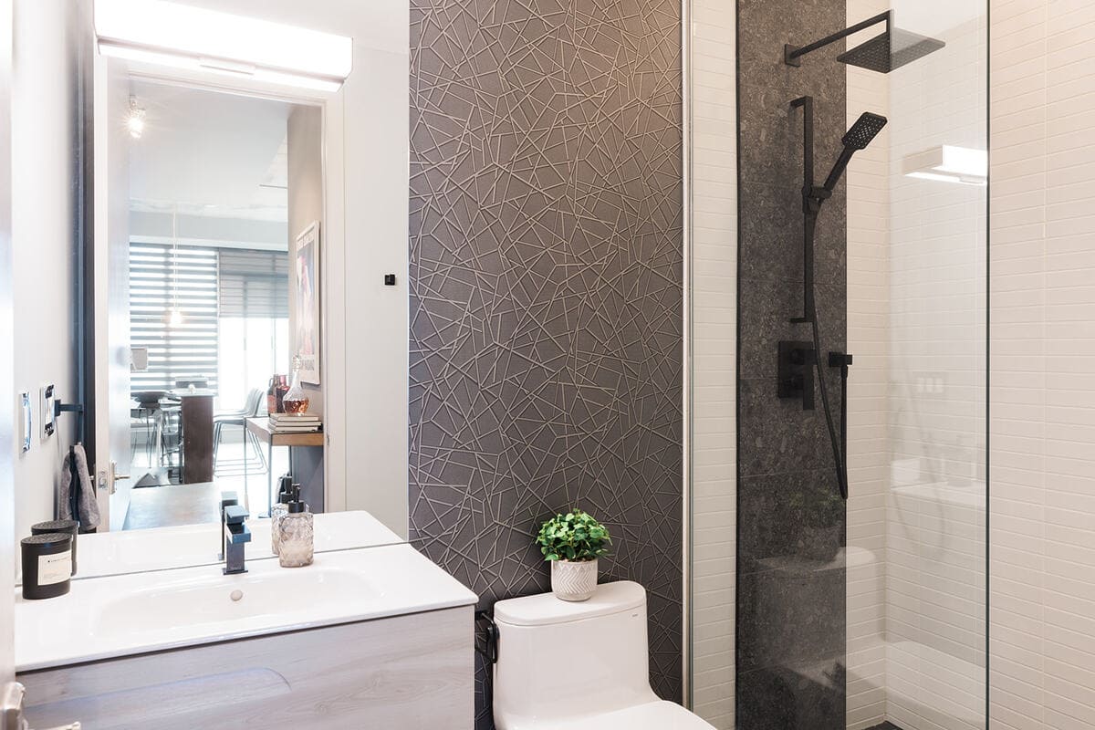 Luxury condo bathroom renovation in Toronto with walk-in shower