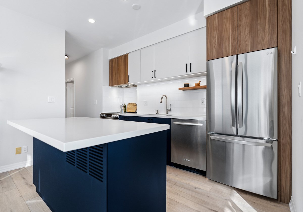 Toronto condo kitchen renovation with flat panel cabinetry and island