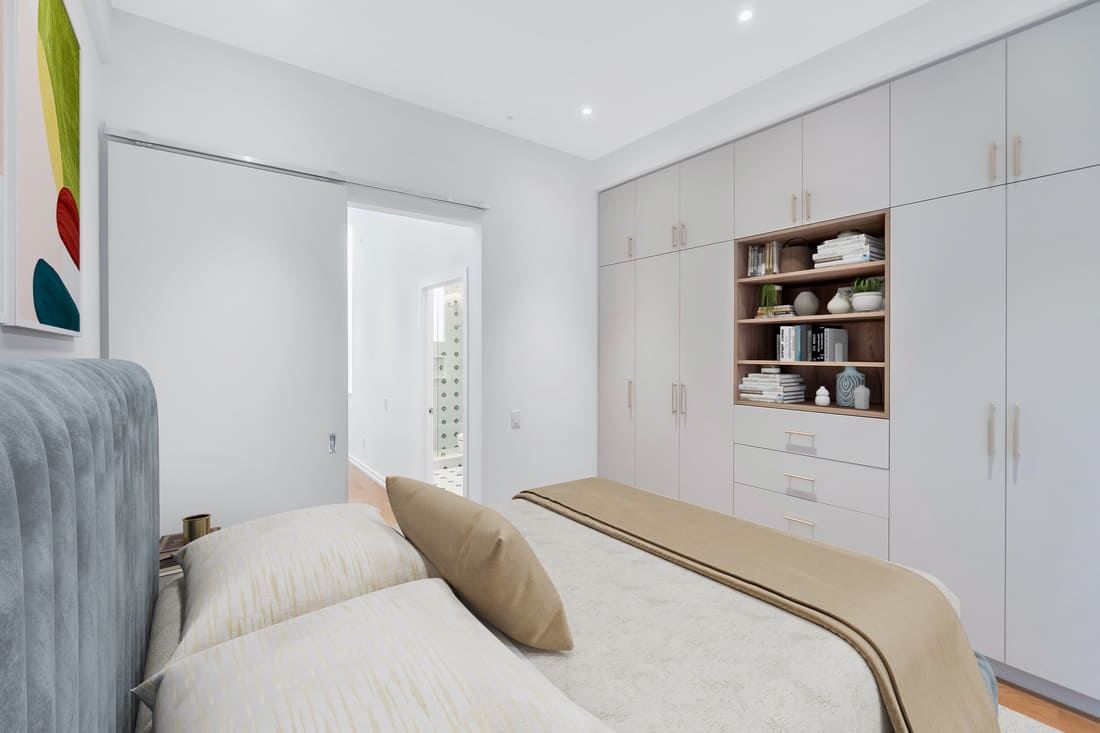 Toronto luxury condo bedroom renovation with floor-to-ceiling closet space and open shelving